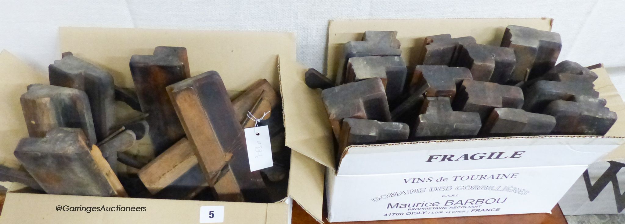 A collection of approximately 24 assorted Victorian beech moulding planes